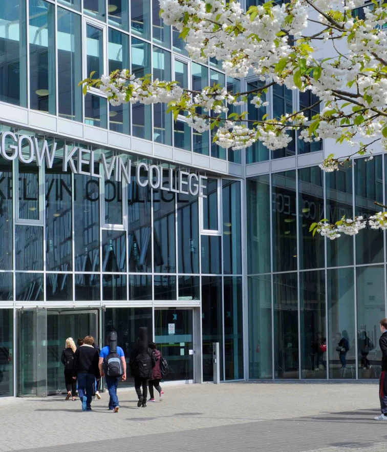 Front view of Glasgow Kelvin College Springburn Campus, featuring the main entrance, glass façade, and campus signage. Front view of Glasgow Kelvin College Springburn Campus, featuring the main entrance, glass façade, and campus signage.